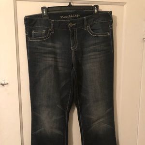 Embellished boot cut jeans by Maurice’s.